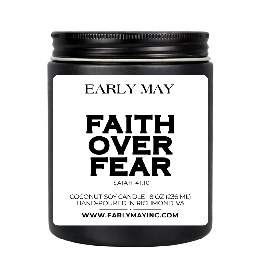 Black candle jar with 'Early May' branding and 'Faith Over Fear' text on a white background