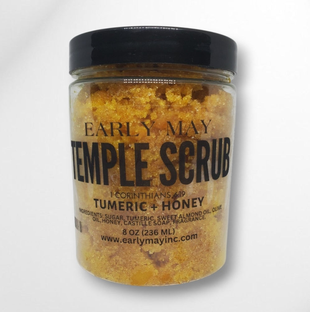 Jar of Early May Temple Scrub with turmeric and honey on a white background