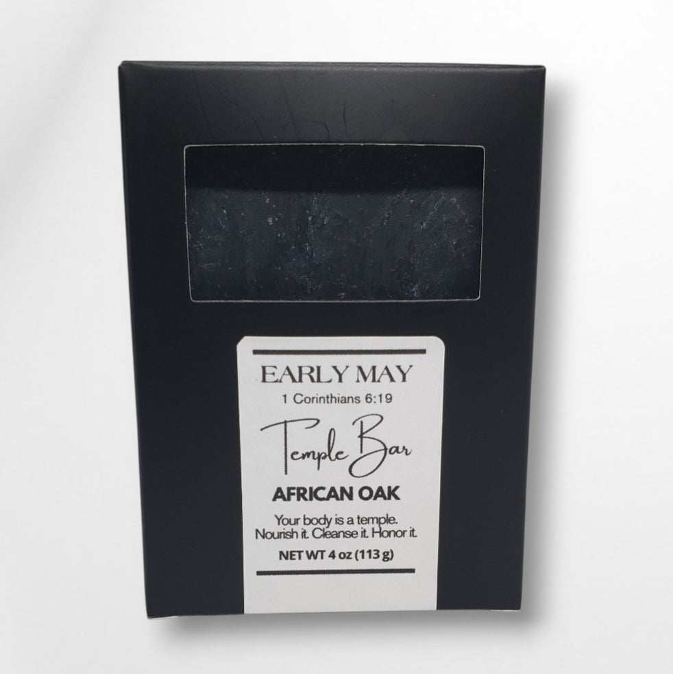 Black soap bar packaging with 'Early May' branding on a white background